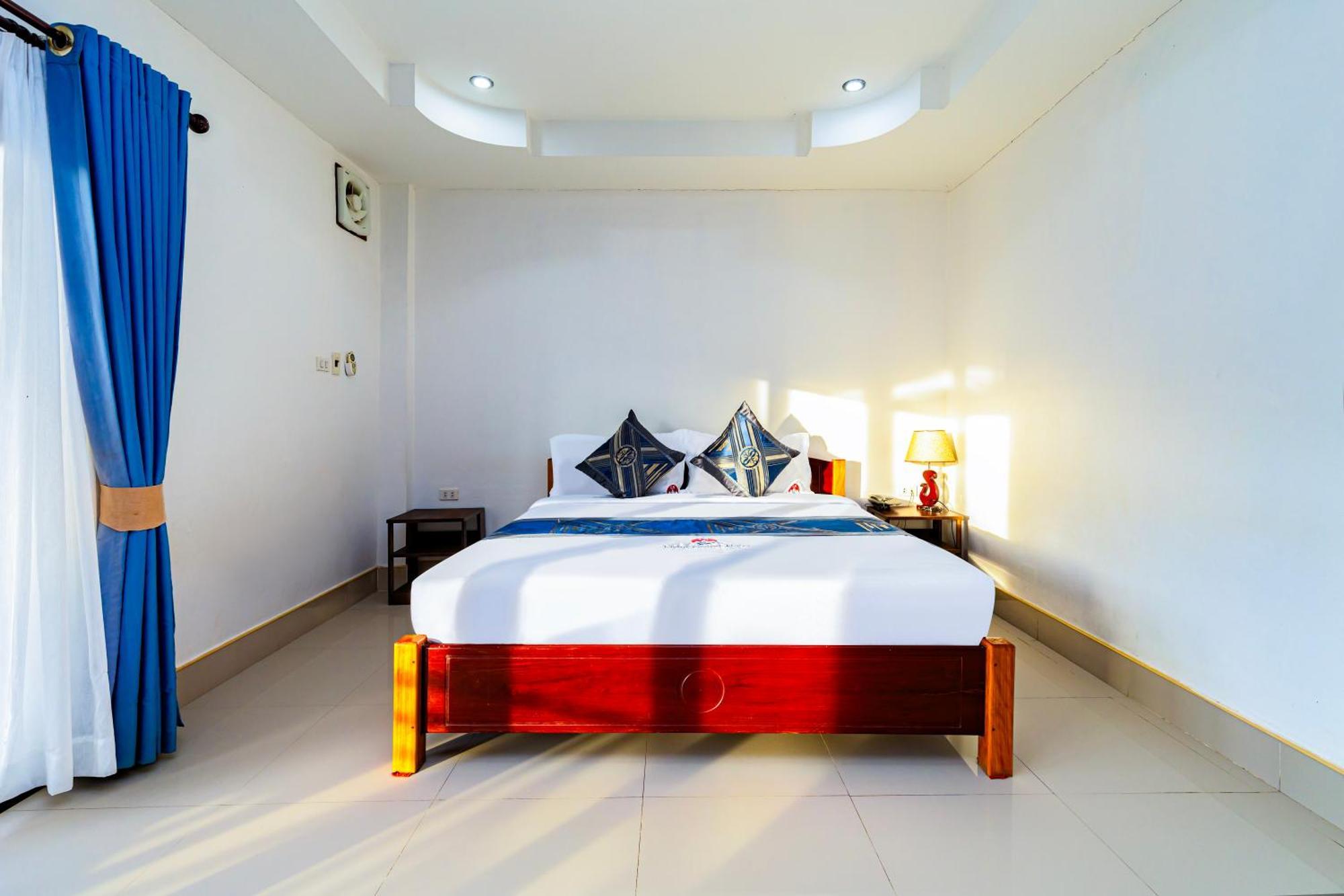 Lisha The Grand Riverside Hotel Vang Vieng Buitenkant foto