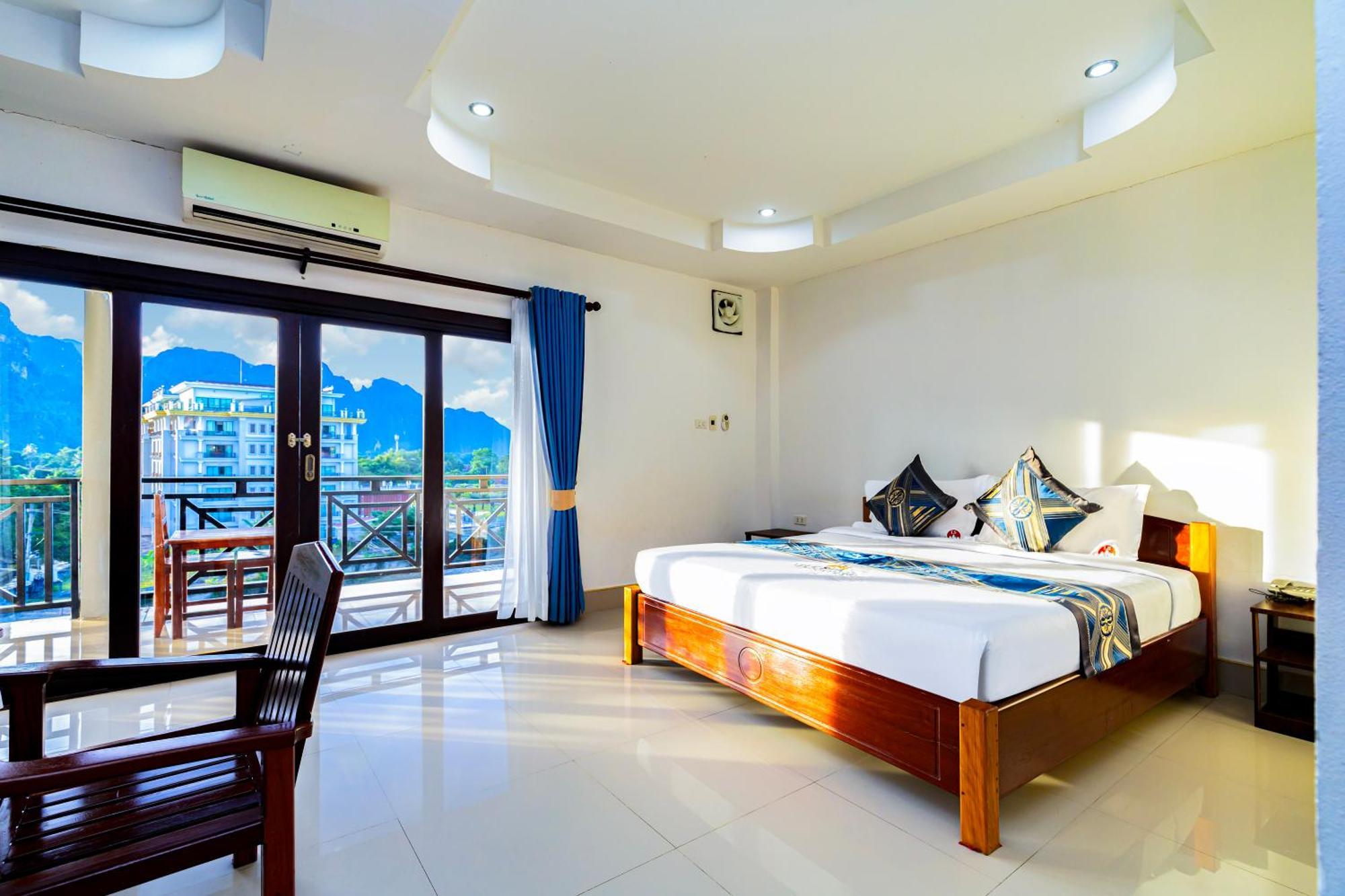 Lisha The Grand Riverside Hotel Vang Vieng Buitenkant foto