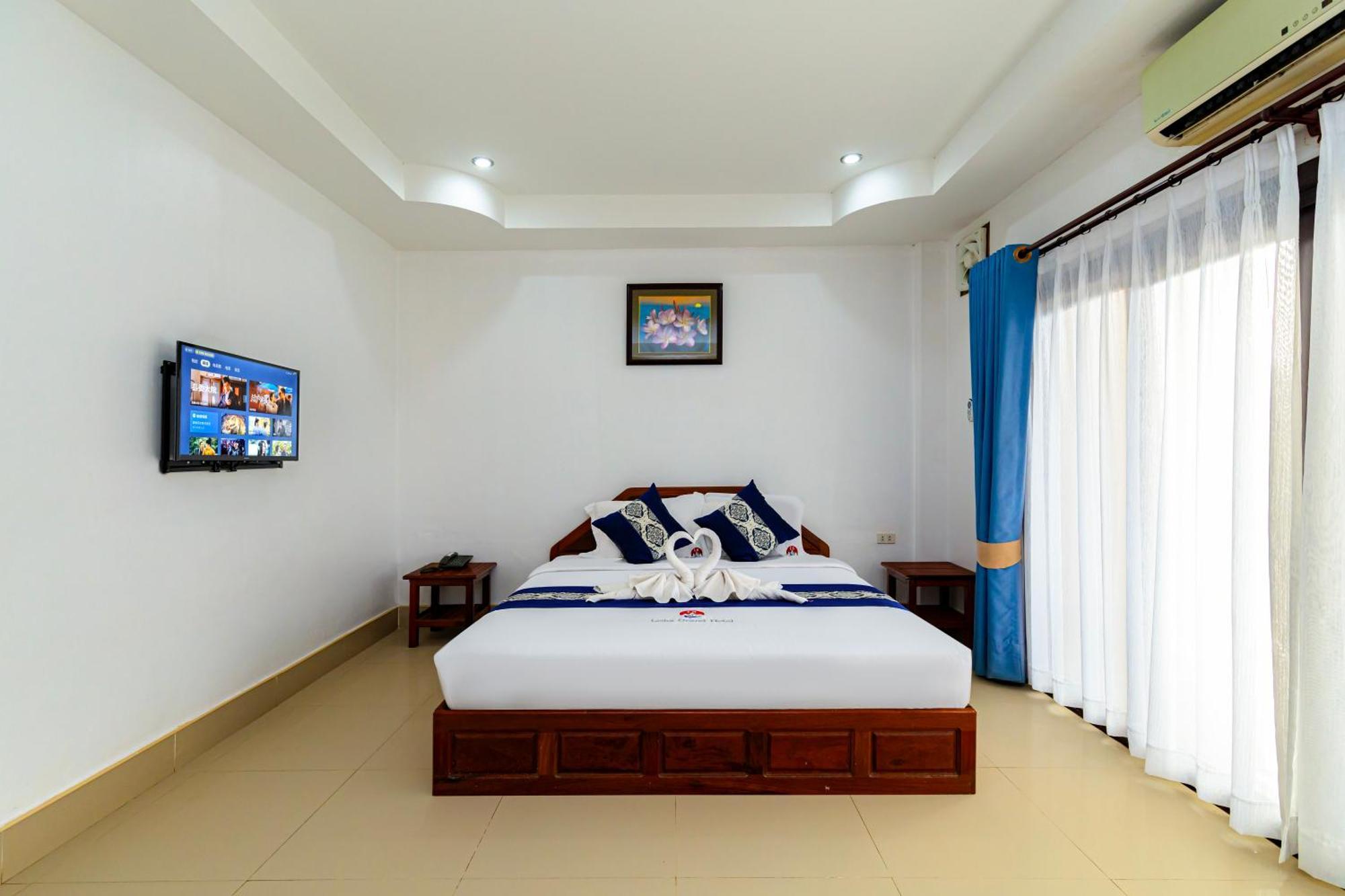 Lisha The Grand Riverside Hotel Vang Vieng Buitenkant foto