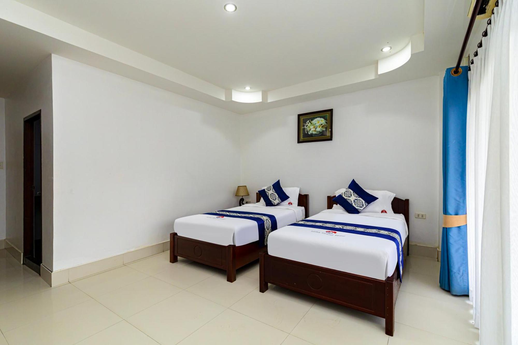 Lisha The Grand Riverside Hotel Vang Vieng Buitenkant foto