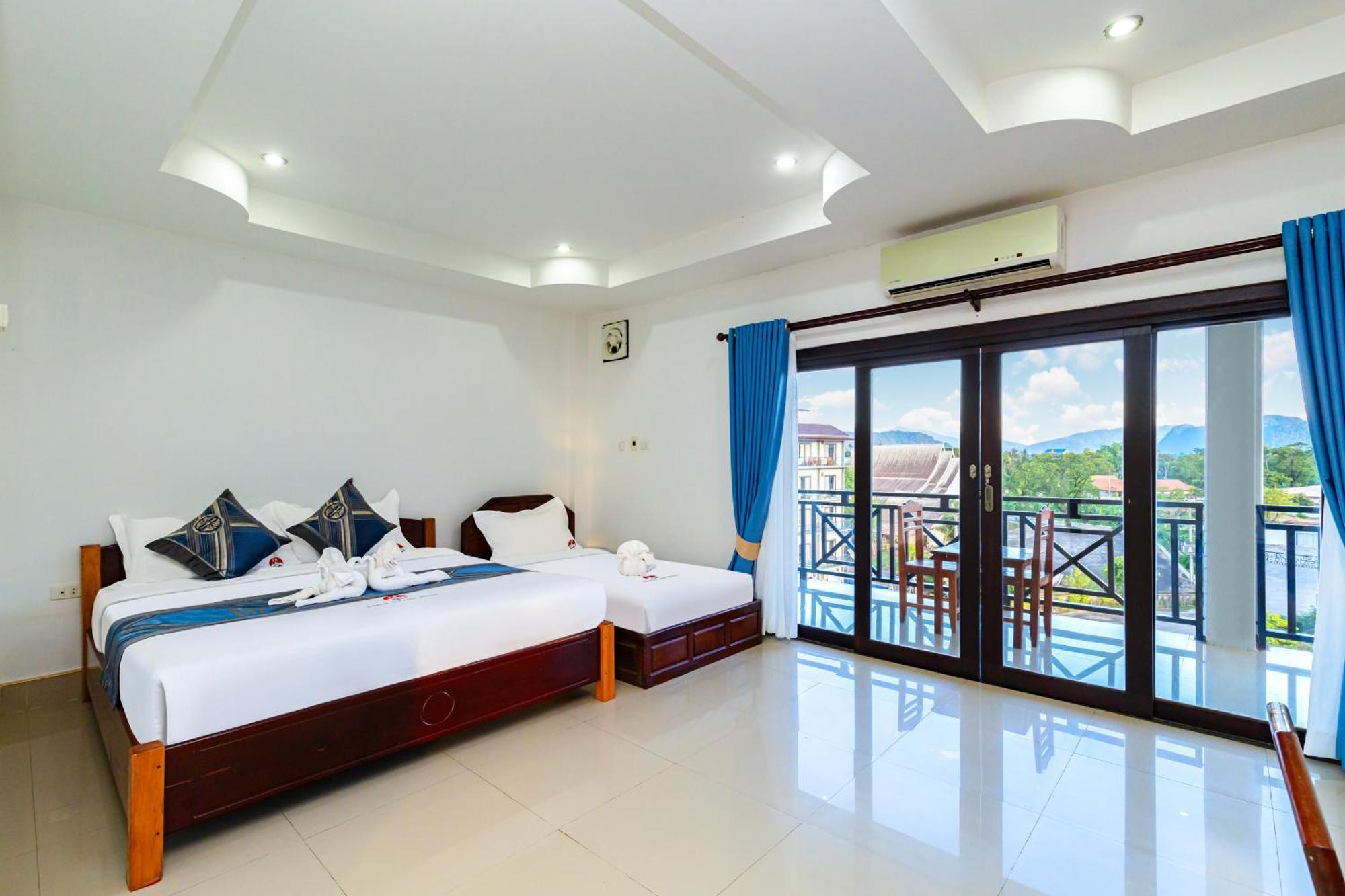 Lisha The Grand Riverside Hotel Vang Vieng Buitenkant foto