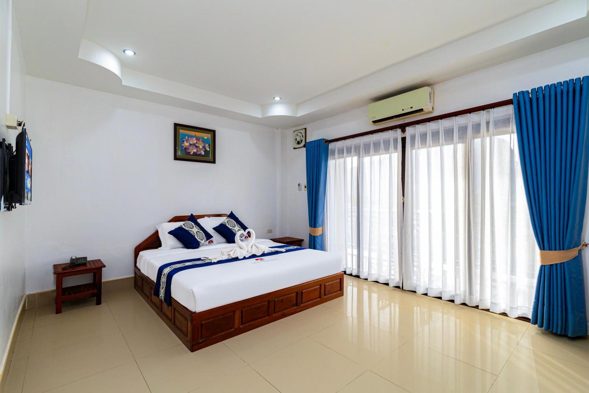 Lisha The Grand Riverside Hotel Vang Vieng Buitenkant foto