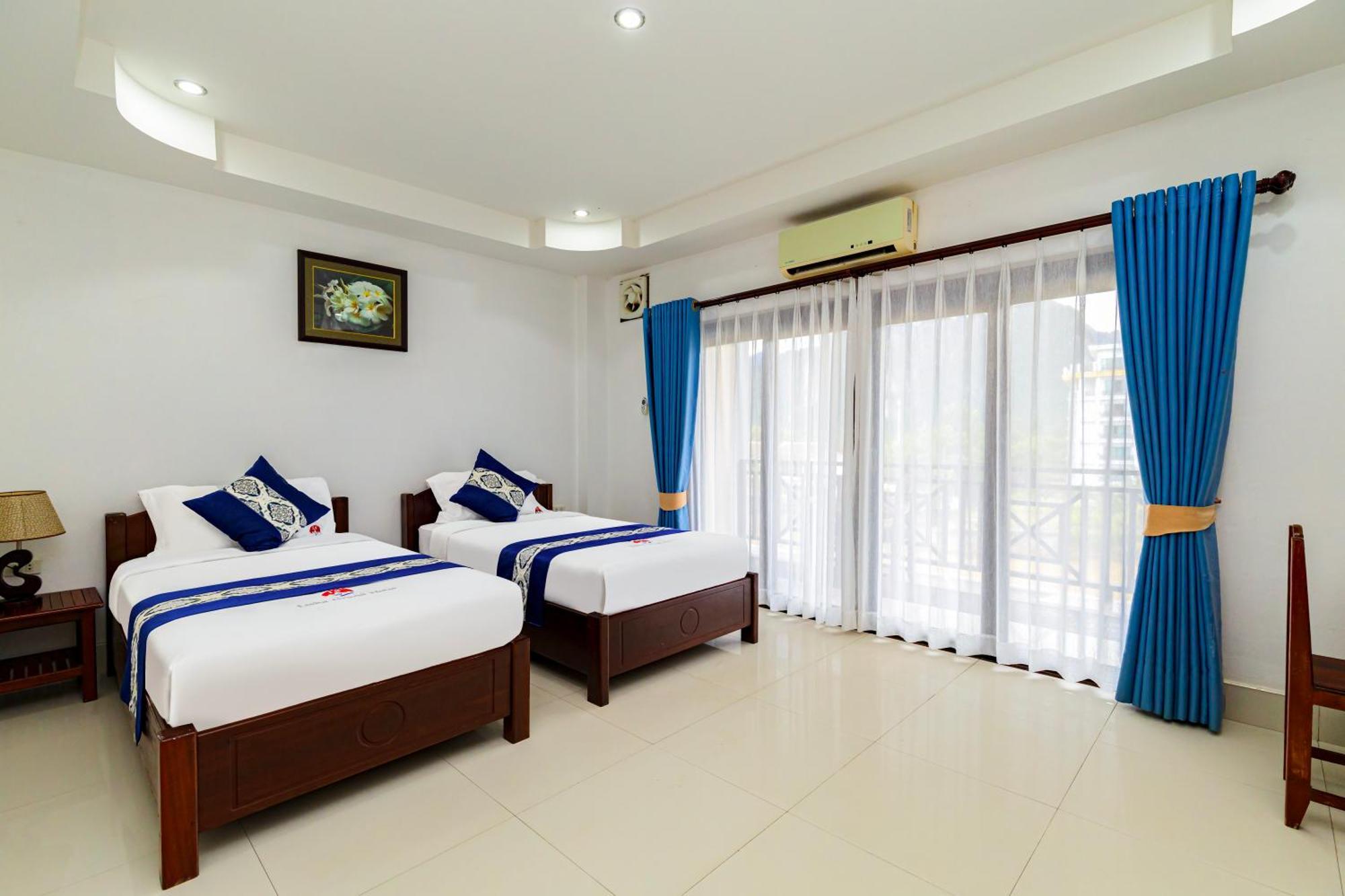 Lisha The Grand Riverside Hotel Vang Vieng Buitenkant foto